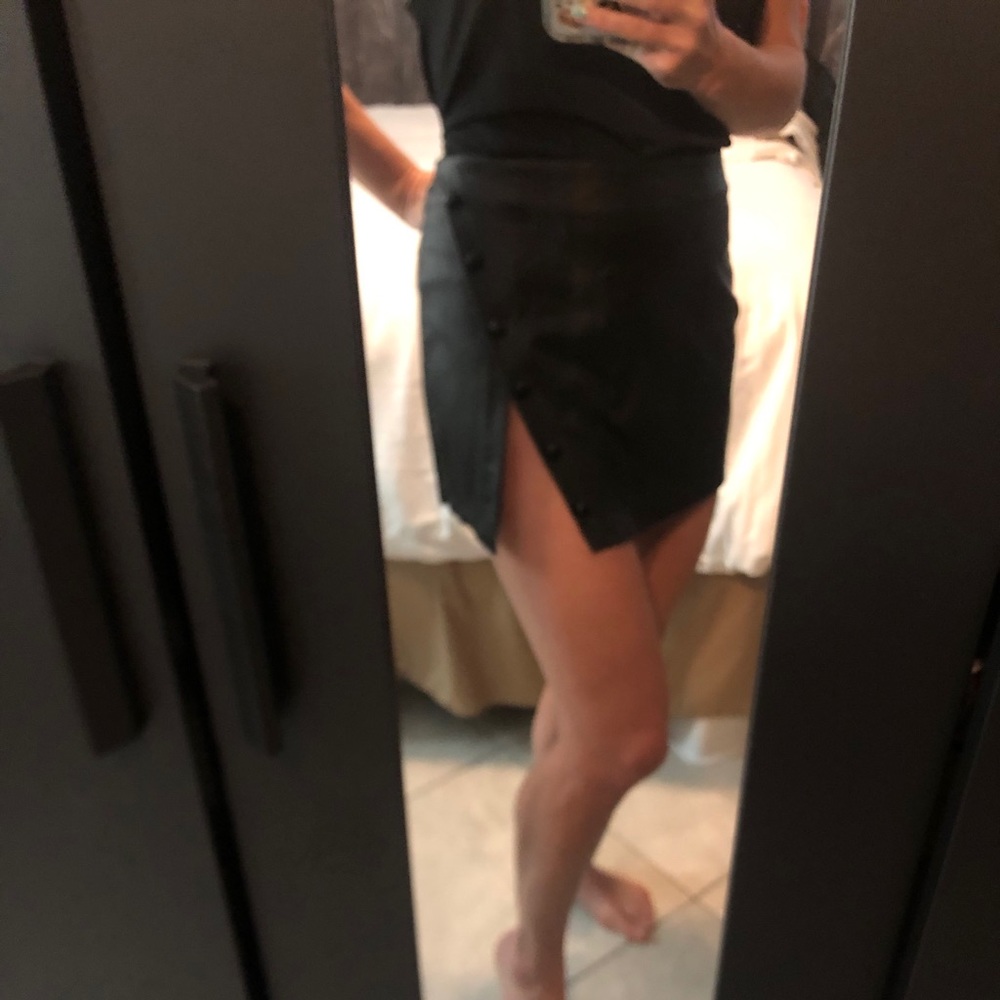 Black pleather skort with button finish in front